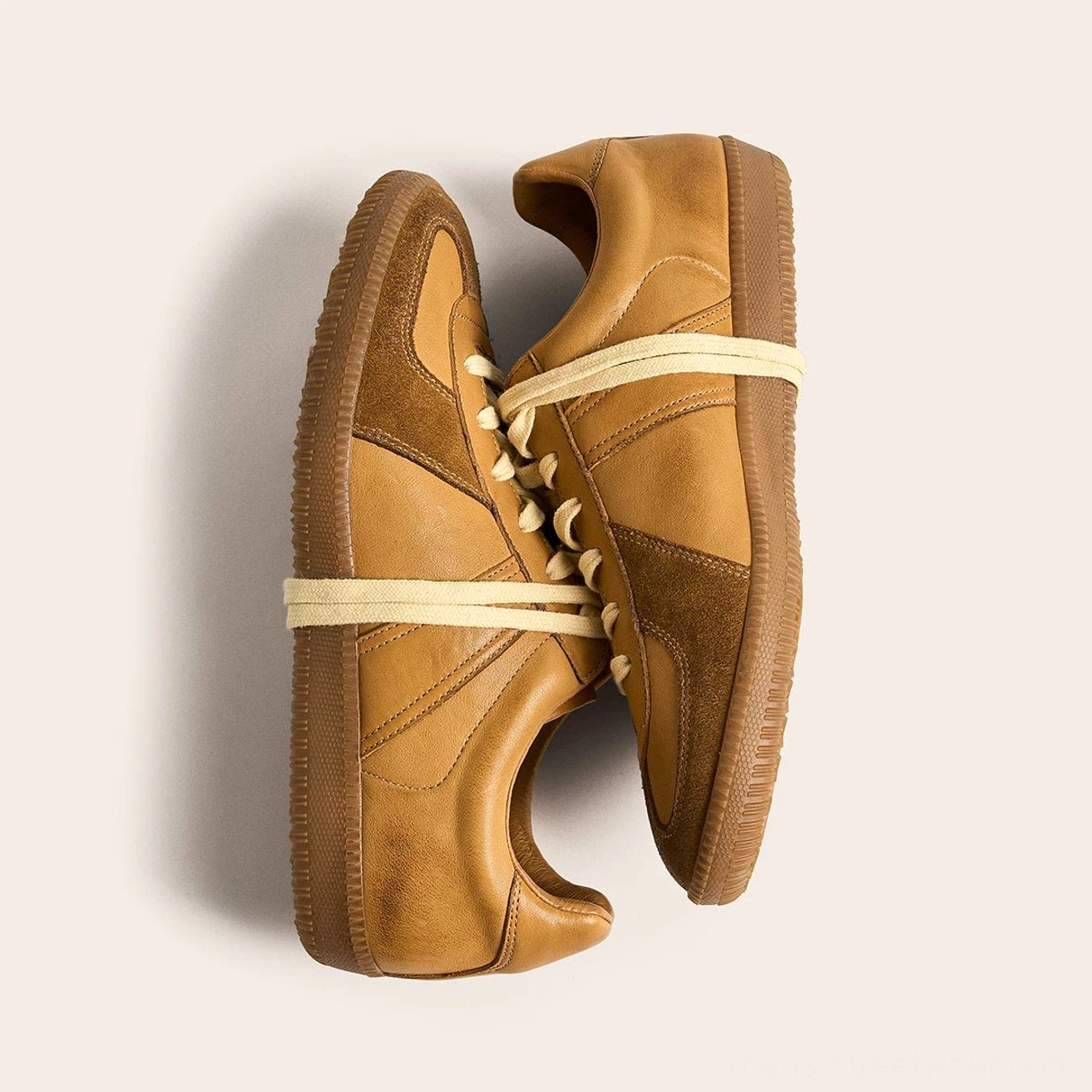 Heritage-inspired vintage leather sneakers with natural worn finish high-density rubber outsole and soft lining