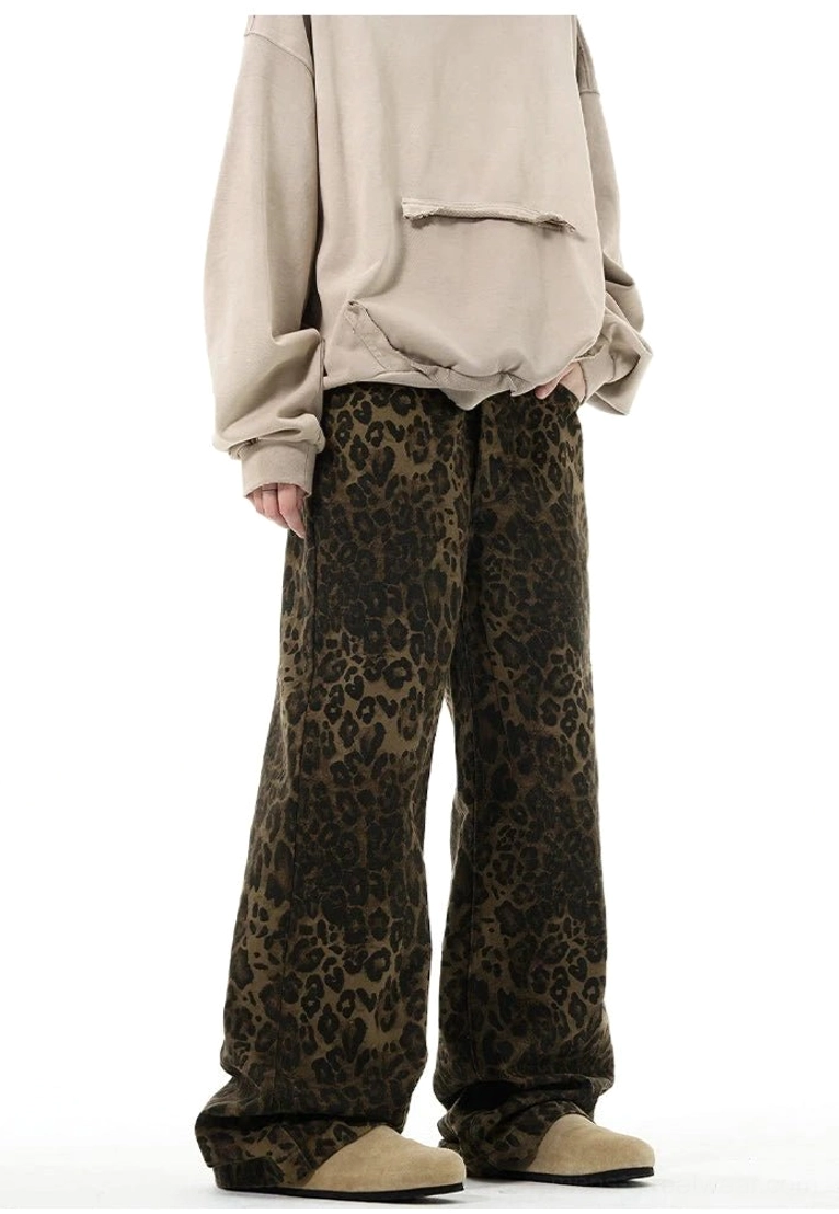 High waist leopard print denim trousers front view showing wide leg drape and full length