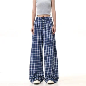 Blue plaid high-waisted wide-leg pants with button-front closure and tailored pleats shown in a full-body Seoul streetwear outfit
