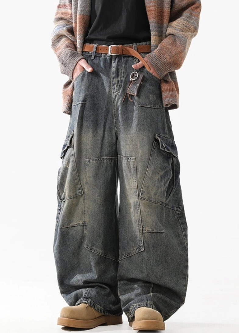 Front angled view of high-waisted vintage washed cargo jeans with wide belt loops, neat stitching, and relaxed Korean streetwear fit