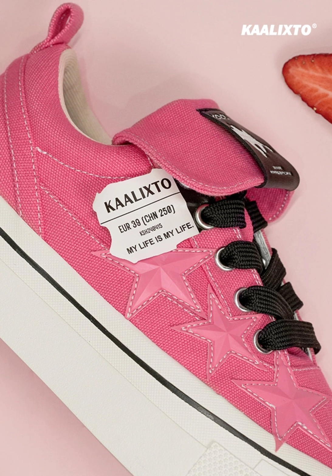 Hot pink canvas sneakers featuring a playful star panel design and raised white sole for Korean street style looks