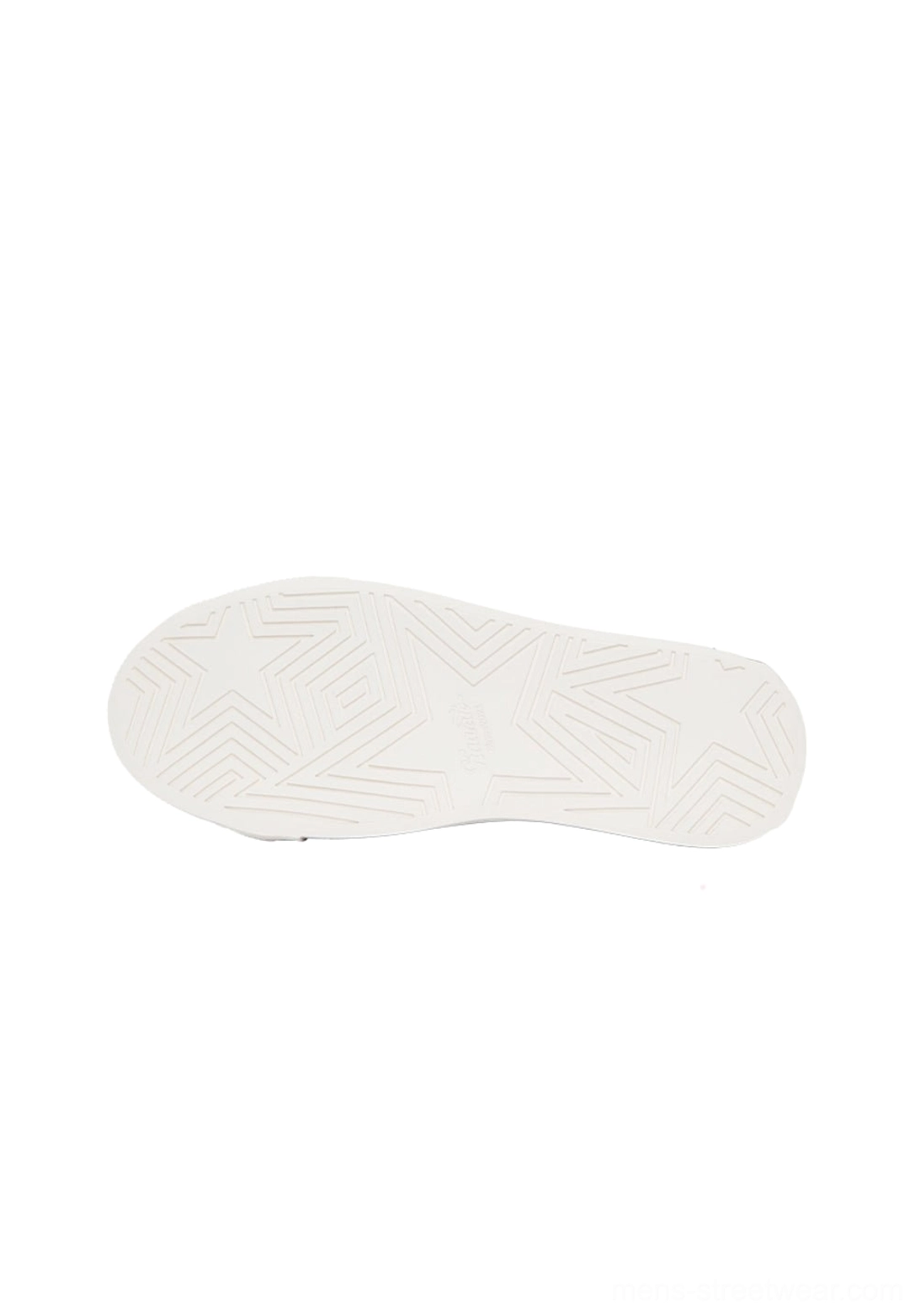 White rubber outsole of hot pink canvas platform sneakers featuring a star shaped anti slip tread pattern