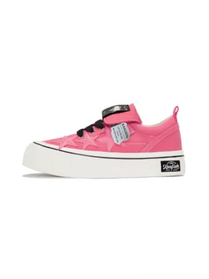 Hot pink raspberry star panel canvas platform sneakers shown in a left side profile with black laces, Velcro tongue strap, white rubber sole, and bold Seoul streetwear styling