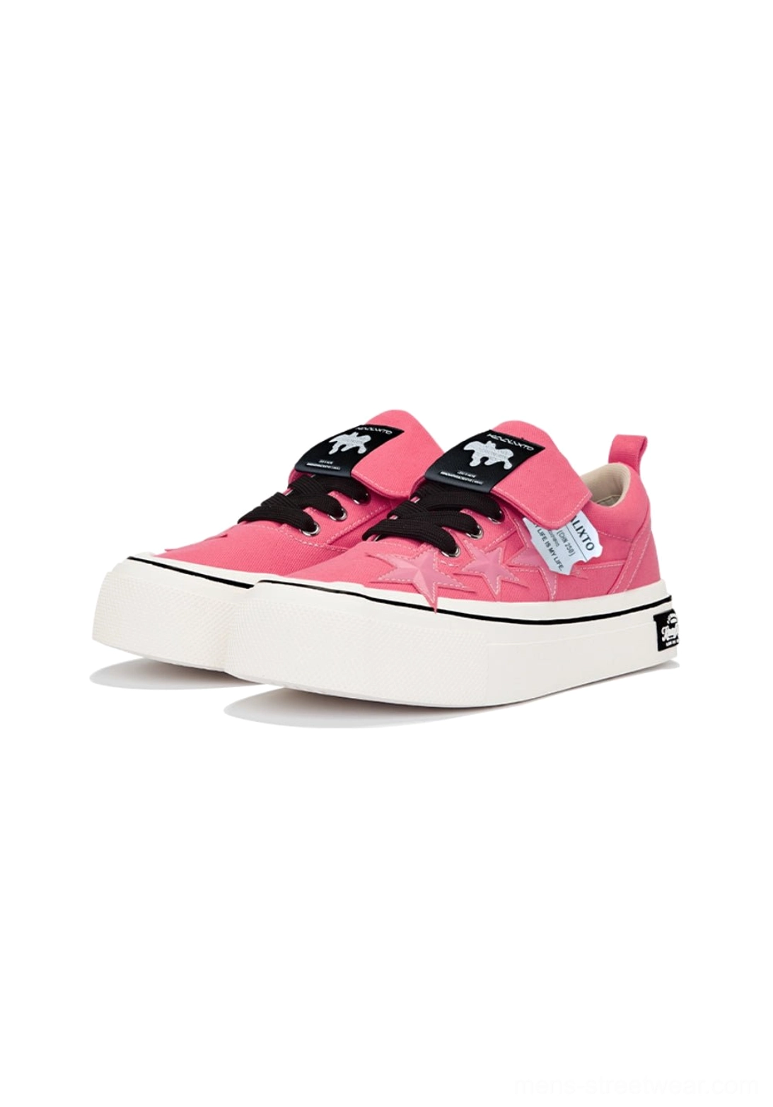 Pair of hot pink star panel canvas sneakers shown in a three quarter product view with black laces, layered upper, and thick white sole