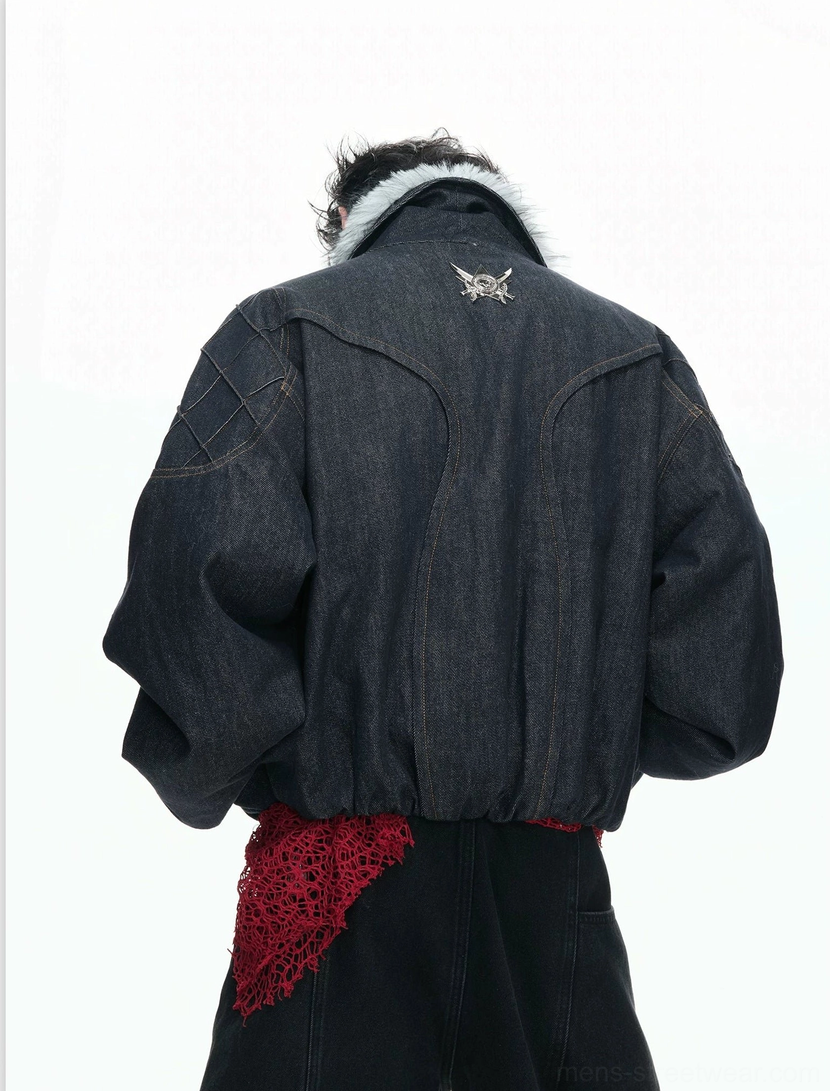 Back view of dark indigo denim faux fur collar bomber jacket showing winged back emblem, elasticated cropped hem and red mesh waist accent