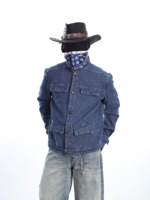 Indigo textured ranch chore jacket front three quarter view with four flap pockets and stand collar