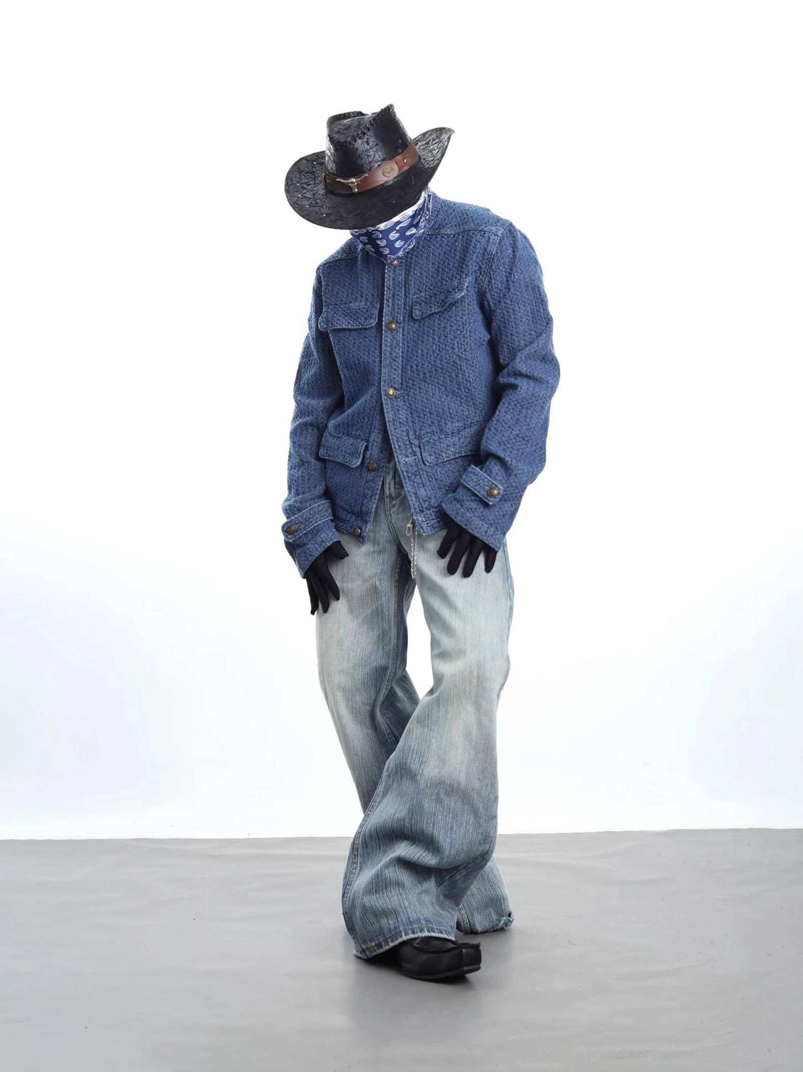 Indigo textured chore jacket side view with matching washed denim trousers and western workwear styling