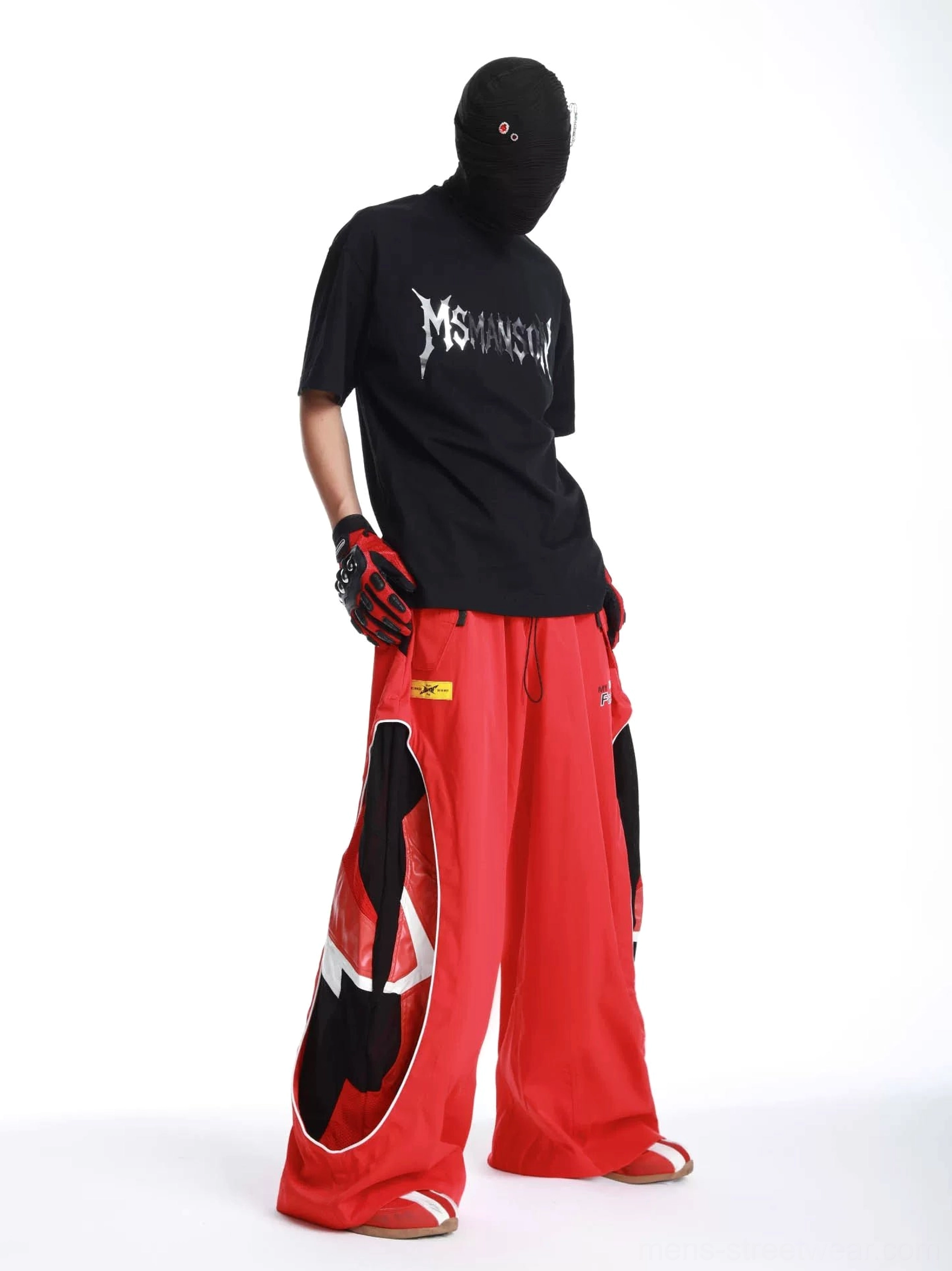 Red color-block ultra wide-leg track pants styled in a bold Korean streetwear outfit