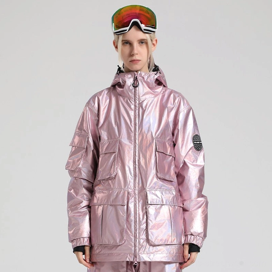 Iridescent pink ski storm shell jacket with holographic glossy finish, hood, zippered front, multiple cargo pockets, and ribbed cuffs