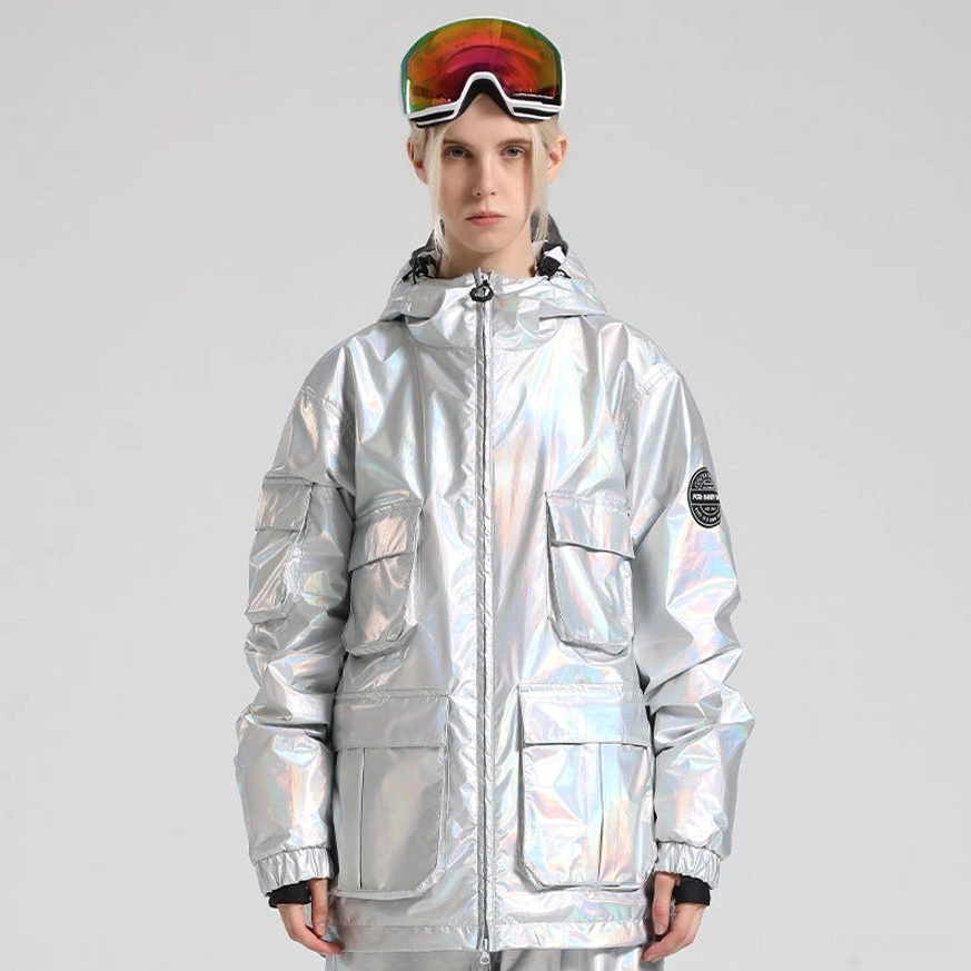 Glossy iridescent silver ski jacket with attached hood, front cargo pockets, wind-resistant cuffs, and futuristic reflective shell finish