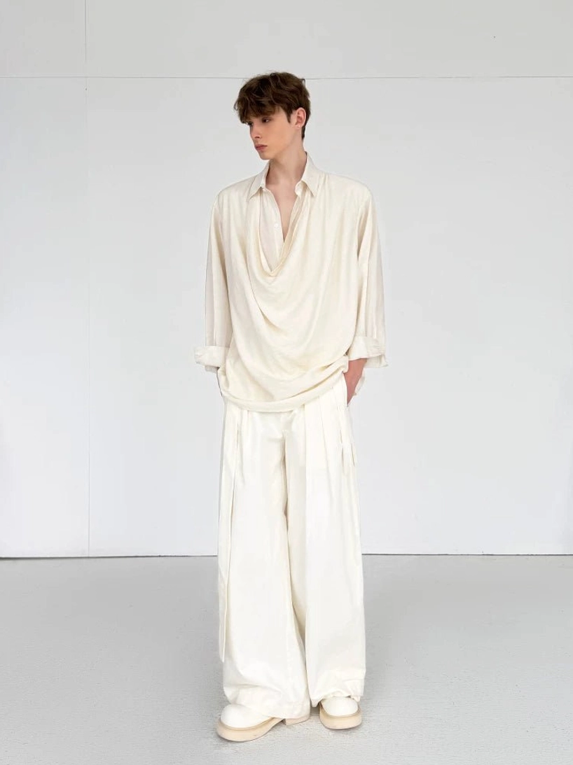 Men's ivory draped shirt paired with matching high-waisted wide-leg trousers in an East Asian fashion outfit