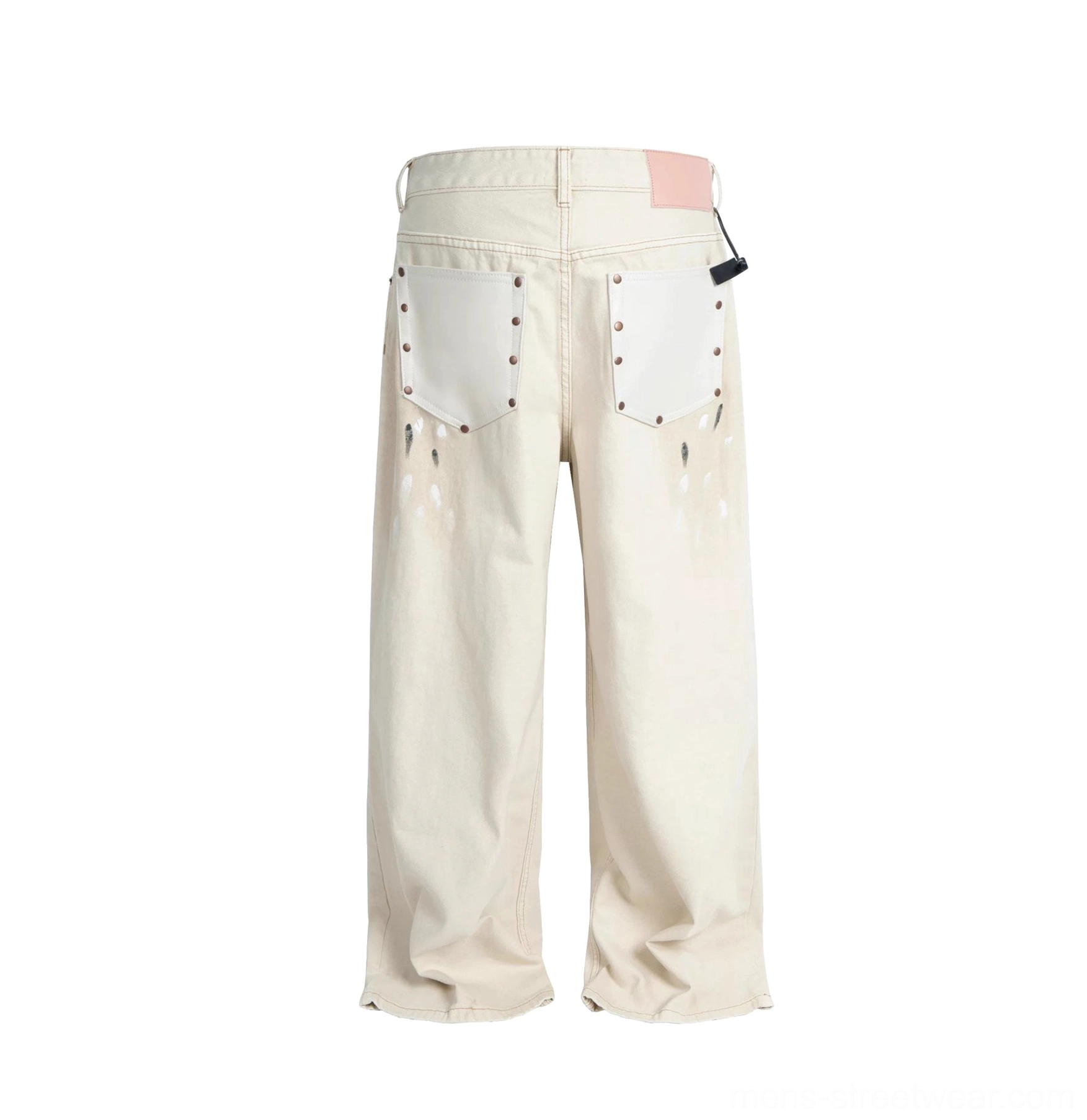 Flat lay back view of ivory wide leg paint splatter jeans with riveted rear pockets and contrast pink waist patch