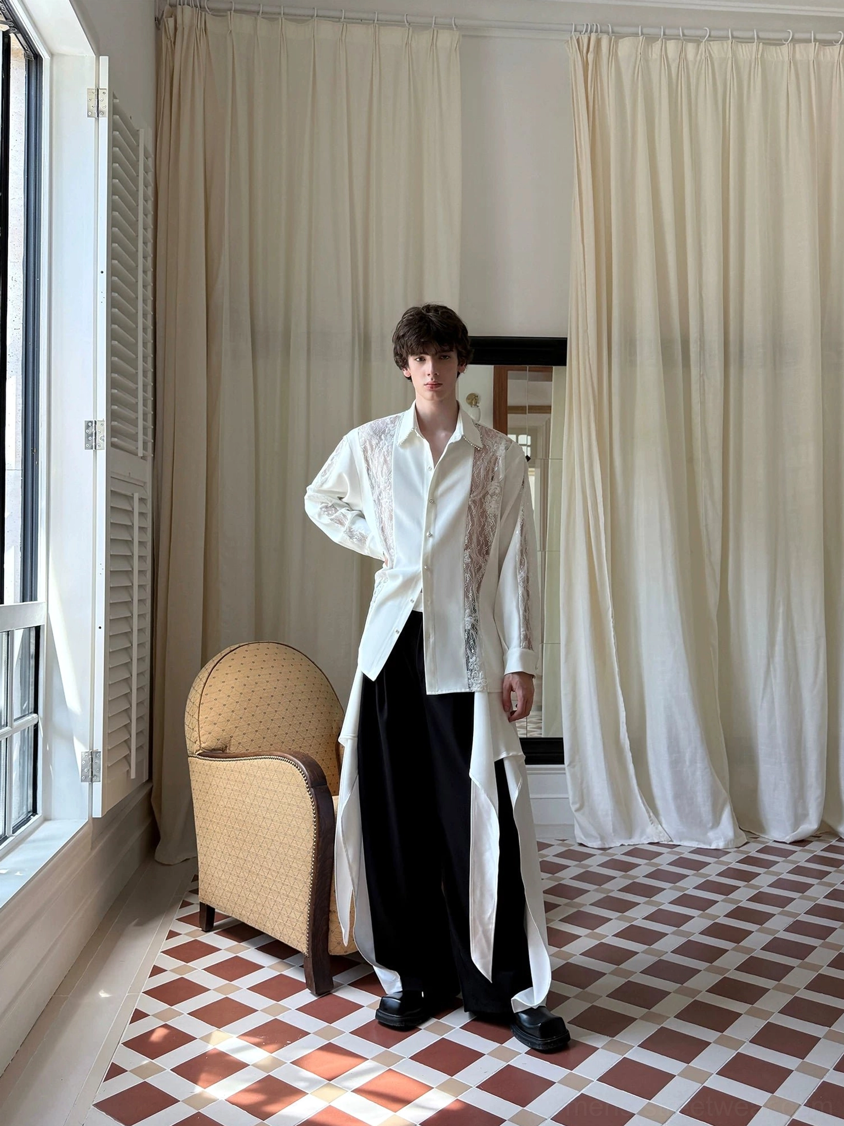Side profile of ivory pearl lace panel oversized shirt for men showing relaxed longline silhouette and curved hem