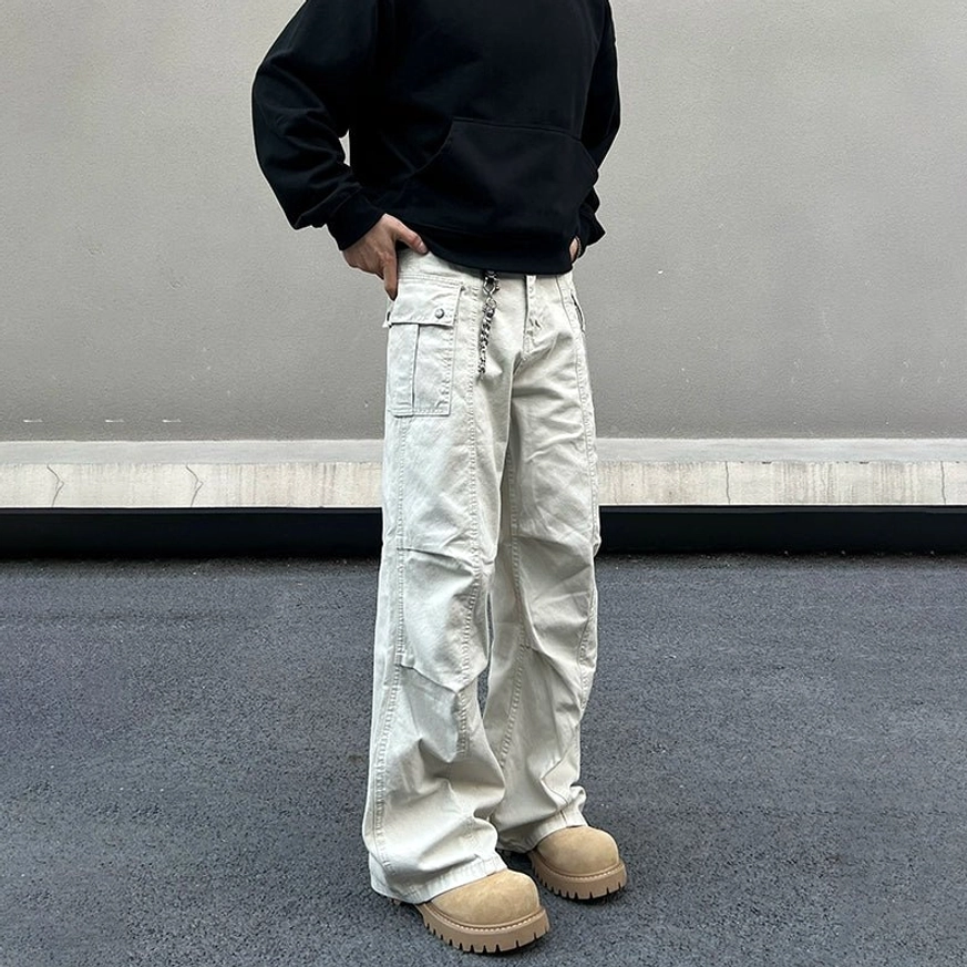 Ivory wide leg utility cargo pants with washed canvas texture side rear view cargo pocket and metal chain detail