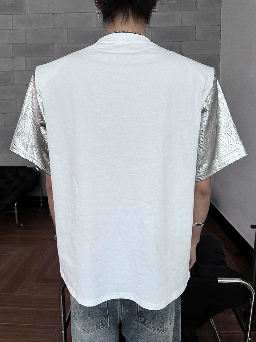 K-pop style metallic sleeve T-shirt with industrial eyelets, long chain laces, relaxed fit, and layered streetwear appeal