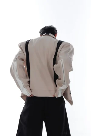 Khaki and black layered faux leather streetwear jacket rear view showing clean back panel and zip cuffs
