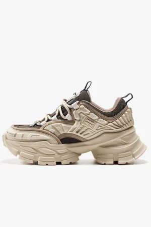 Two tone khaki and brown mechanical platform sneaker with layered upper panels chunky sole and utility inspired streetwear design