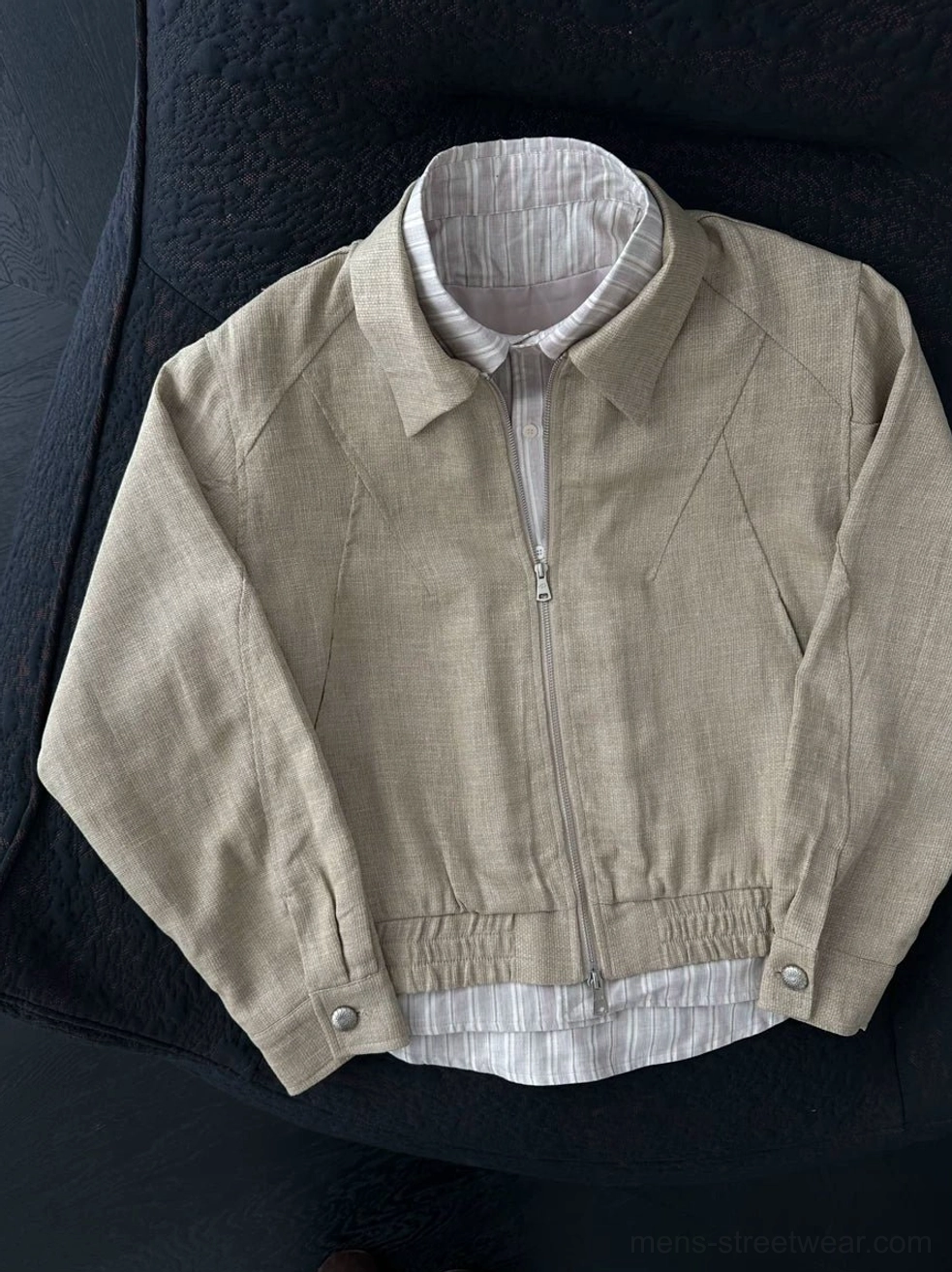 Khaki layered collar linen blend zip-up streetwear jacket flat lay showing striped shirt-style collar and hem detail