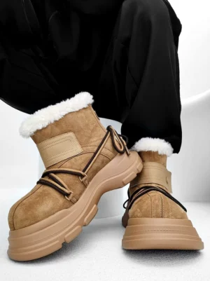 Rear side view of khaki suede-finish platform shearling winter boots with plush white faux-fur cuff and chunky rubber sole