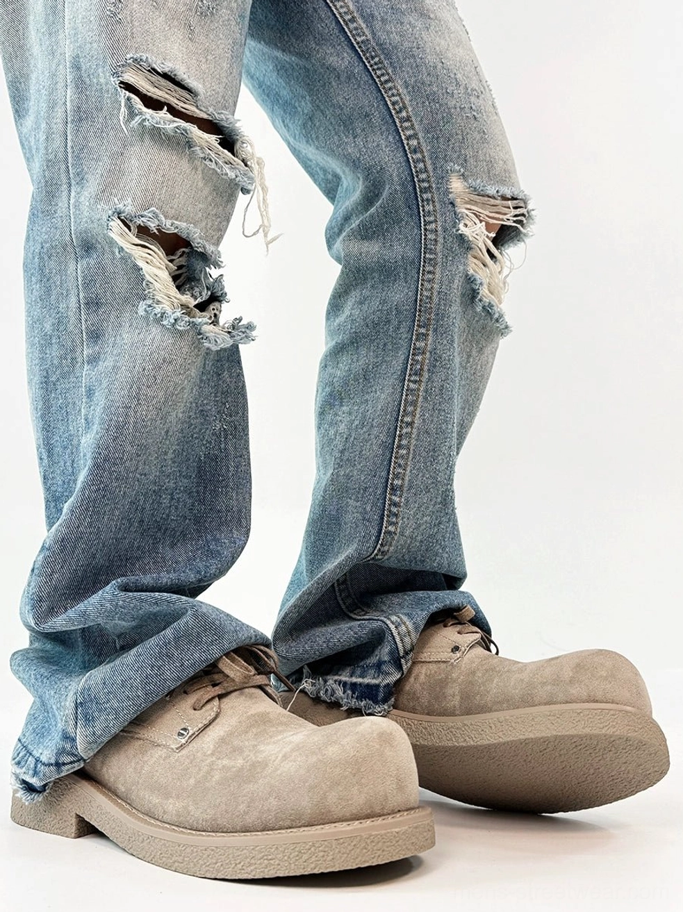 Khaki suede platform derby shoes side profile featuring a low-top derby shape and thick crepe-style rubber outsole