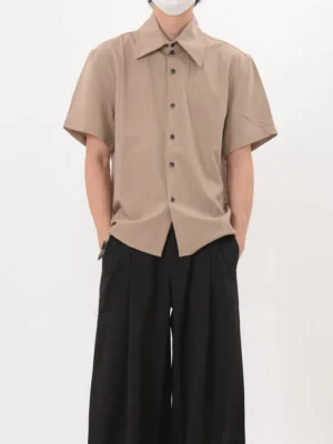 Khaki vertical stripe short sleeve button up shirt shown from the front with relaxed Seoul streetwear fit and curved hem