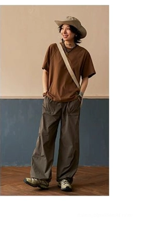Korean-inspired cotton raglan T-shirt with relaxed proportions, clean body, and understated streetwear character