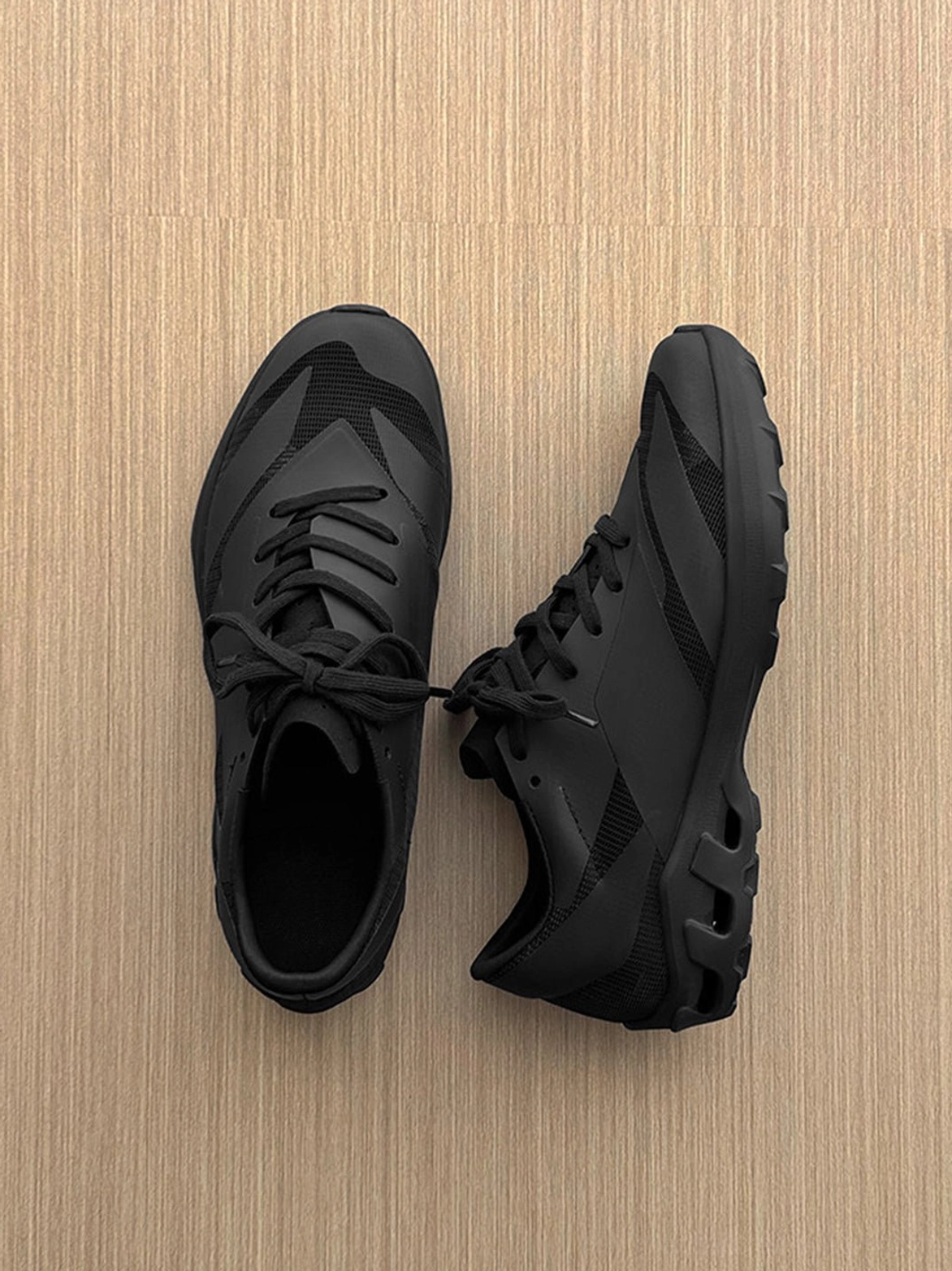 Korean-inspired low-profile sneakers with flexible arch-supporting outsole, minimalist athletic shape, tonal detailing, and versatile everyday streetwear appeal