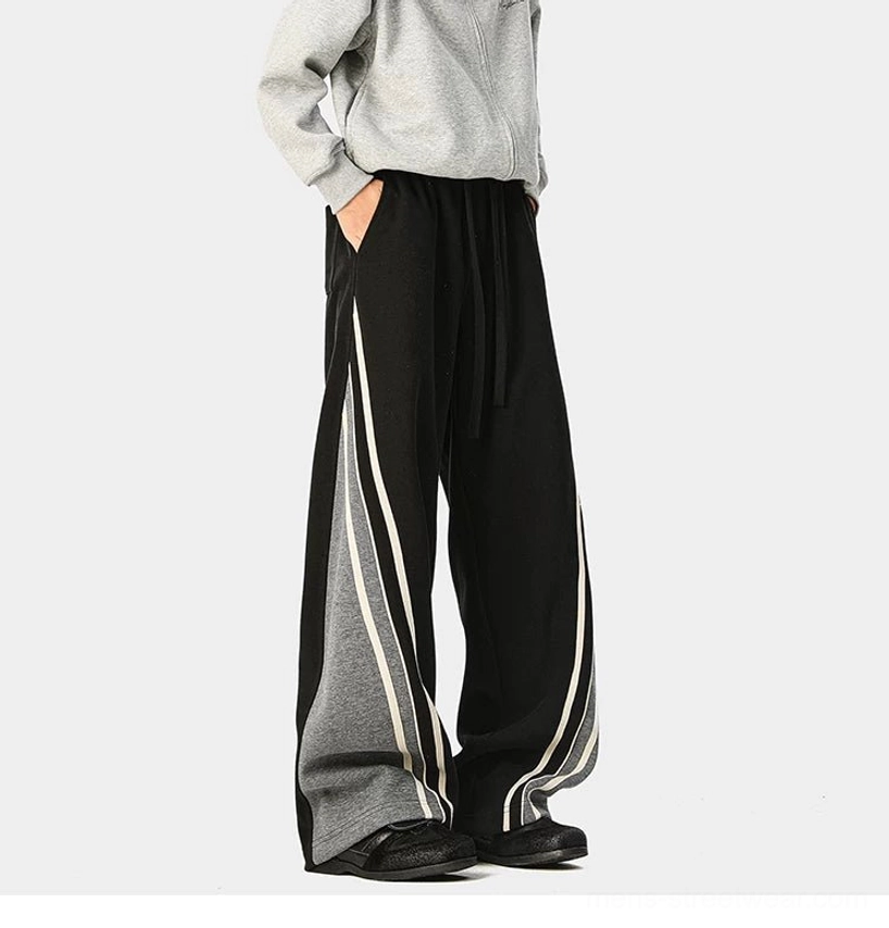 Korean-inspired wide-leg varsity pants with contrast stripe detailing, relaxed proportions, and everyday casual styling