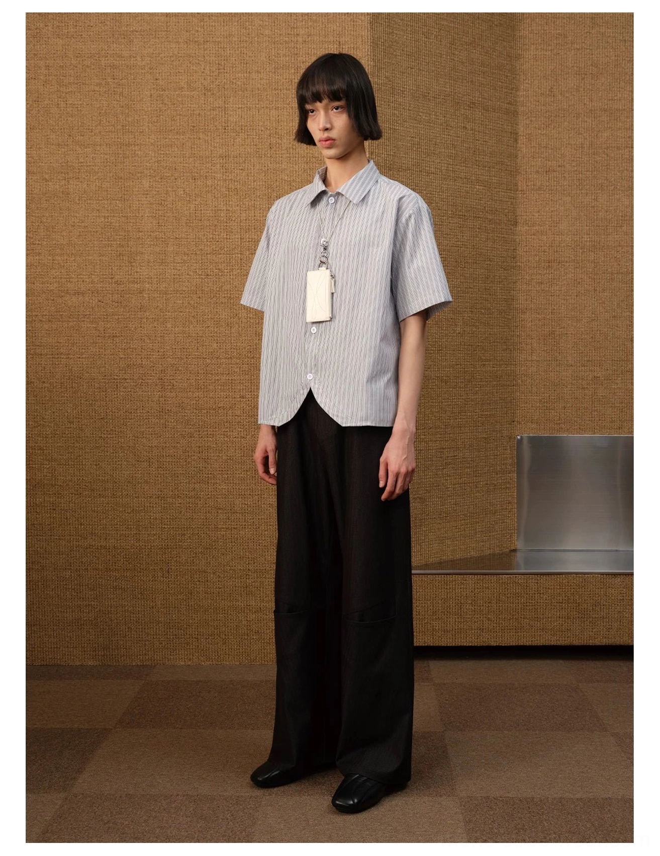 Full body front outfit featuring a Korean pinstripe short sleeve curved hem shirt with black wide leg trousers