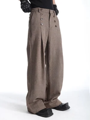 Three-quarter side view of tailored Korean streetwear wide-leg trousers with button fly belt loops and pleated front