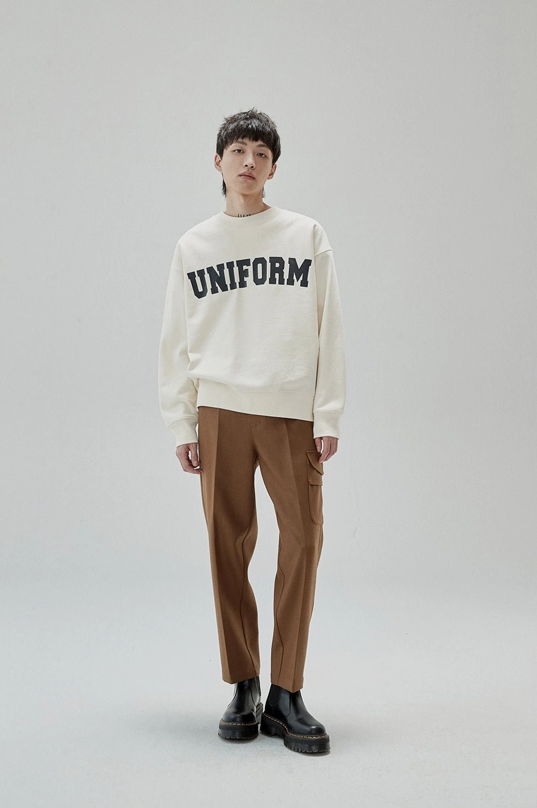 K-pop style inspired UNIFORM sweatshirt with understated collegiate graphic and relaxed fit