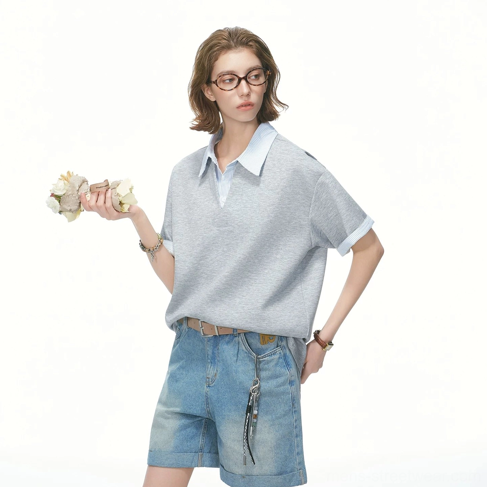 Black layered collar oversized knit polo tee with white contrast cuffs and relaxed streetwear proportions