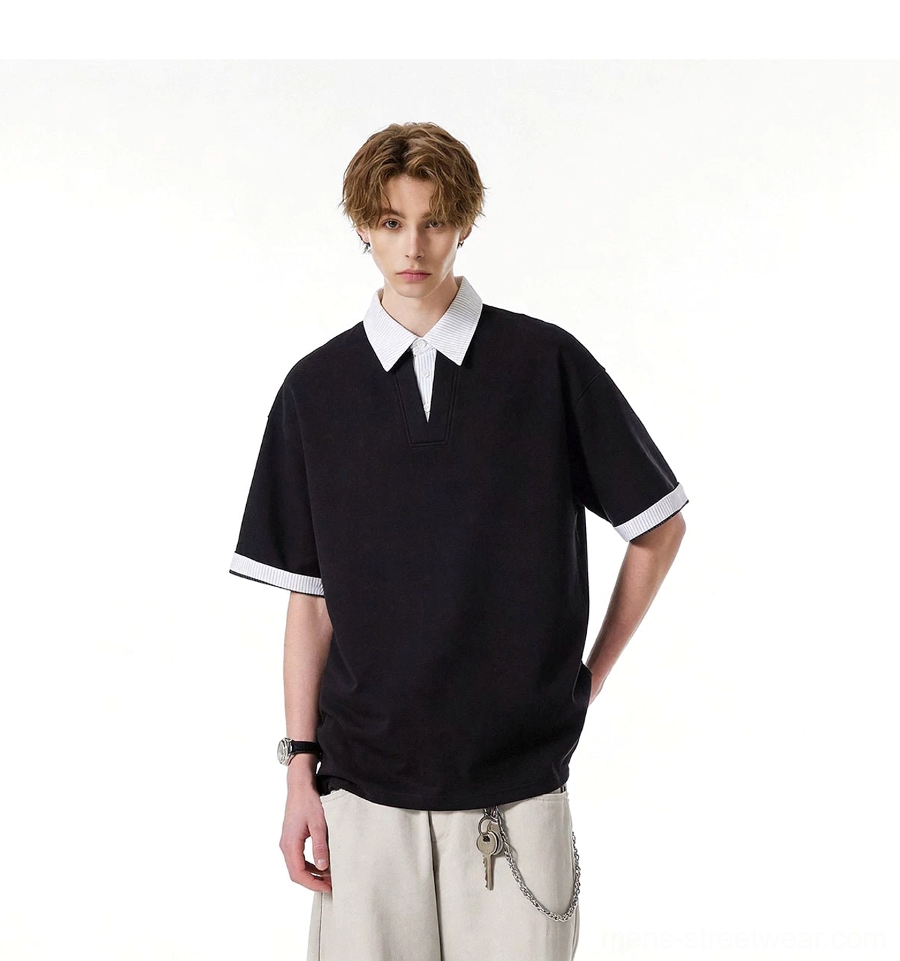 Black oversized knit polo tee with white layered collar and contrast cuffs in Korean mens streetwear outfit