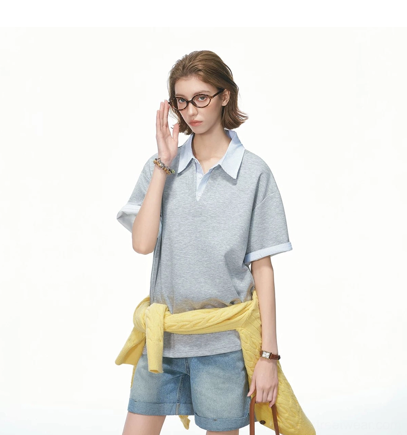 Oversized grey knit polo tee with light blue layered shirt collar and dropped shoulders streetwear styling