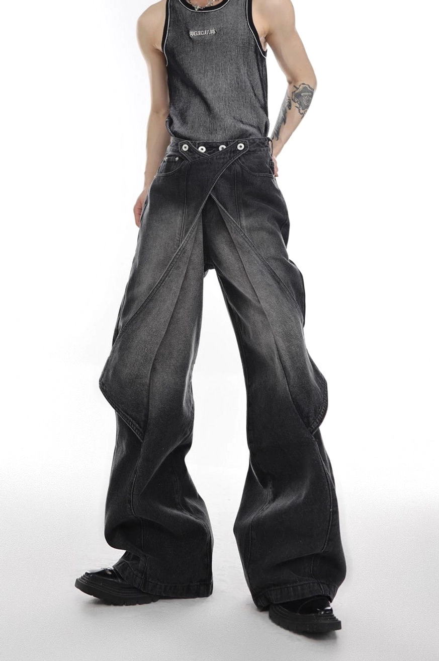 Washed black layered cross-waist flared denim jeans with relaxed wide-leg silhouette in full front view
