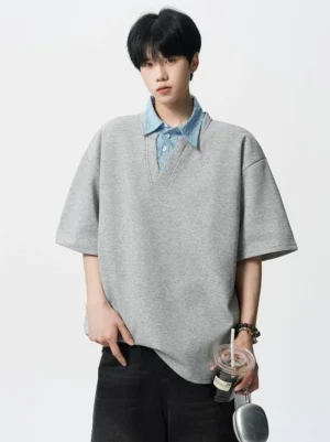 Heather gray layered striped collar oversized polo tee for men styled in a Korean streetwear studio look