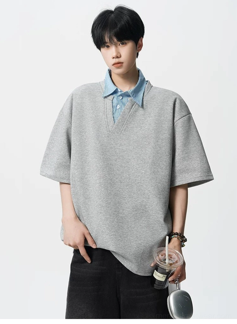 Men's layered striped collar oversized polo tee showing relaxed fake two-piece streetwear styling