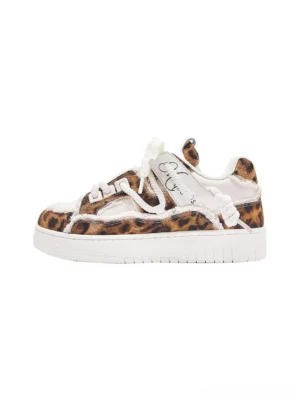 Leopard deconstructed platform canvas sneakers shown in a full side profile with raw white canvas overlays frayed edges decorative laces and thick white rubber sole