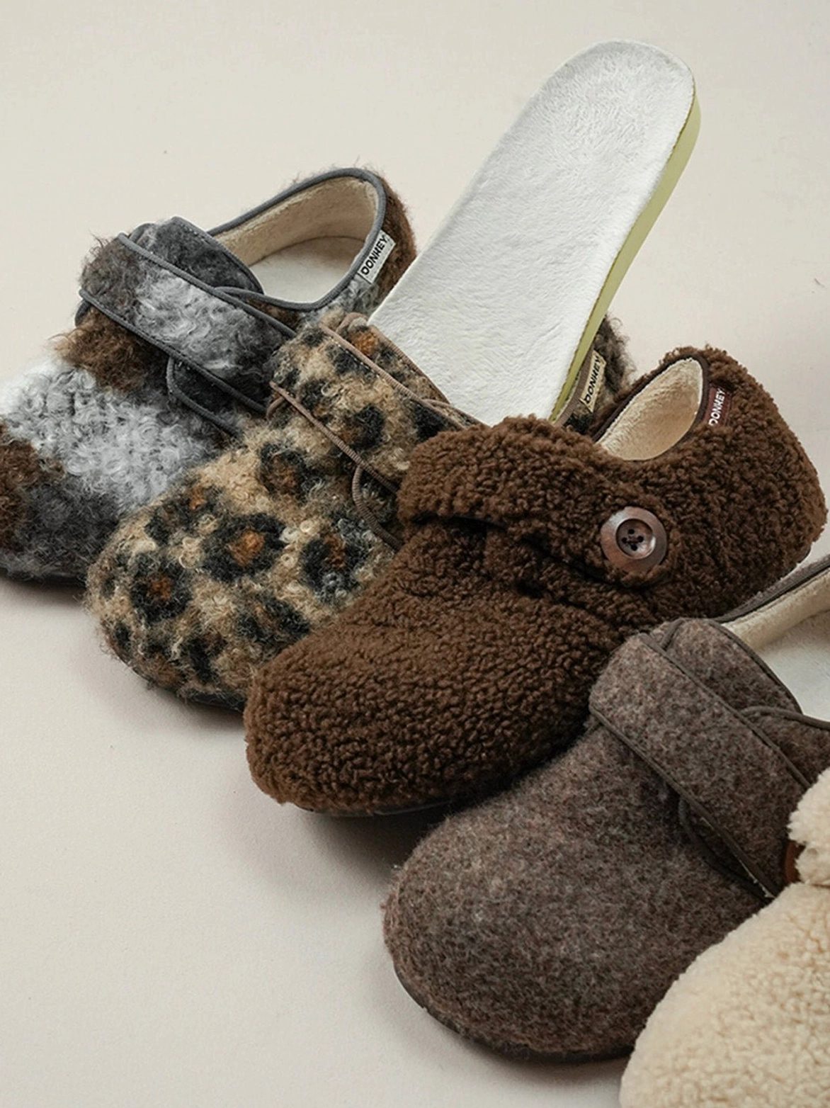Leopard print faux fur Velcro slip-on shoes with plush upper and rubber sole
