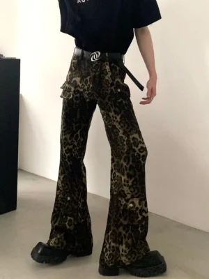 Front three-quarter view of leopard print wide-leg cargo pants styled with a black streetwear T-shirt and chunky platform shoes
