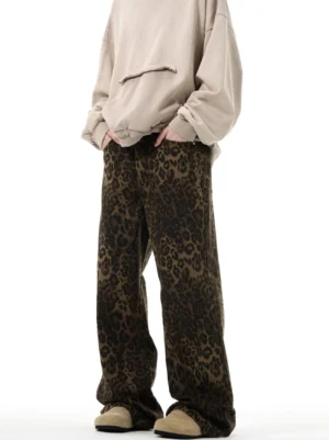 Leopard print wide leg trousers front view showing high waist and relaxed denim silhouette