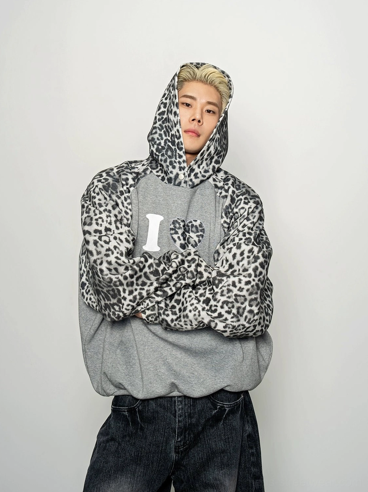 Close front view of grey oversized hoodie featuring leopard print hood and sleeves with bold I Love My Soul chest print