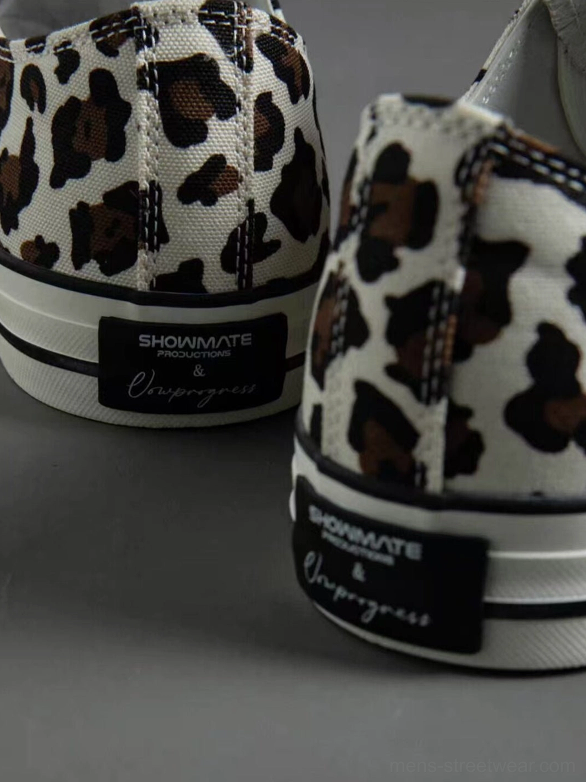 Fashion-forward leopard print canvas sneakers with oversized spider tongue detail for Korean streetwear and alternative outfits