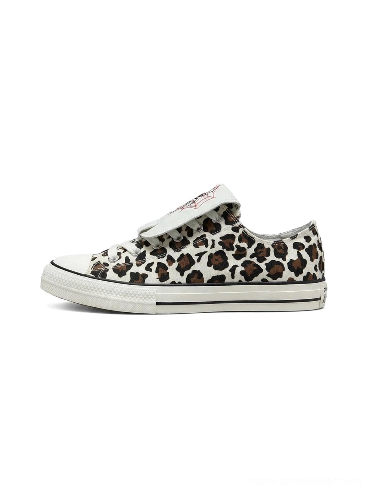 Close product view of unisex leopard canvas sneakers with extended spider tongue, contrast laces, rounded toe, and white rubber outsole