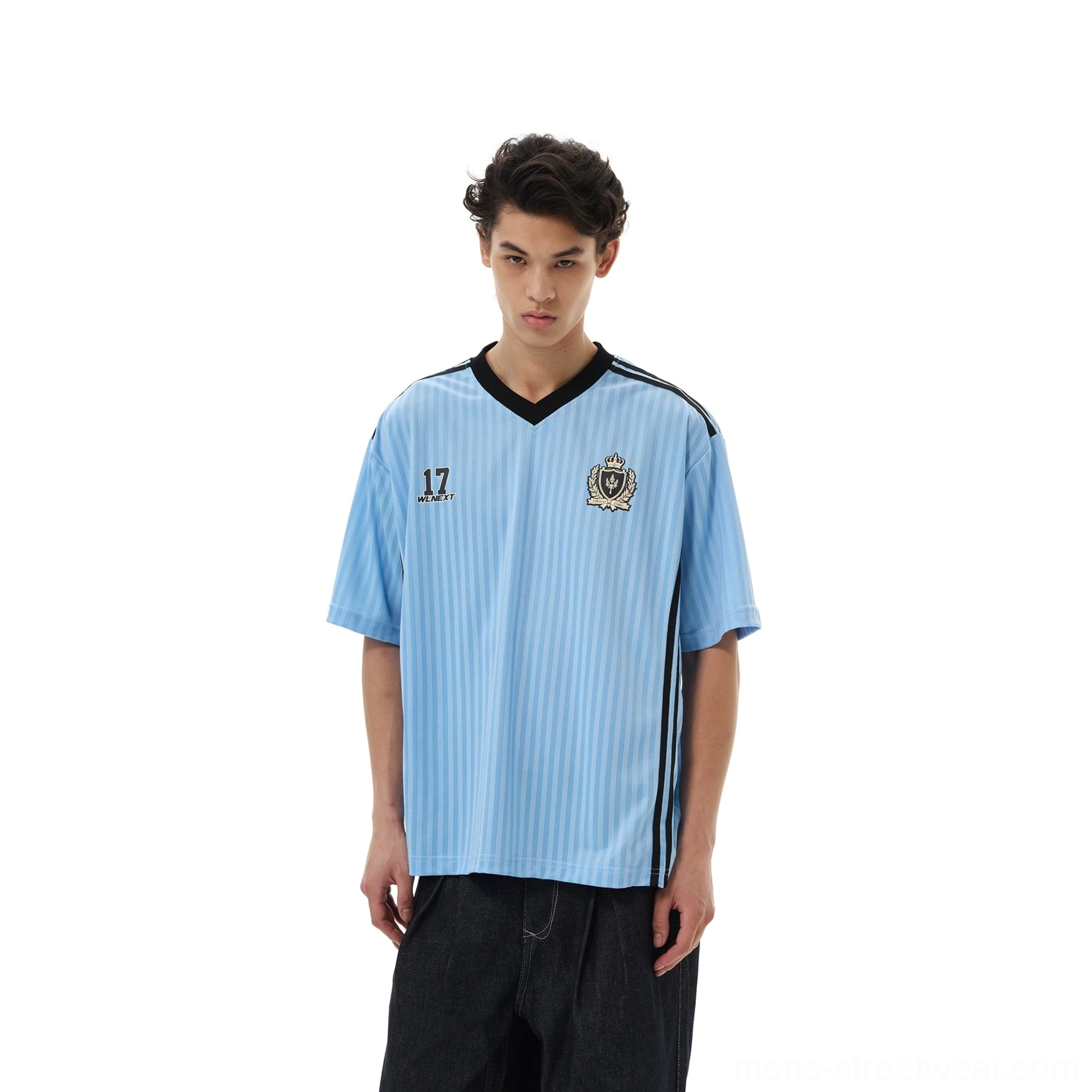 Light blue crested soccer jersey tee product image with number 17 chest graphic, vertical pinstripes, and relaxed fit