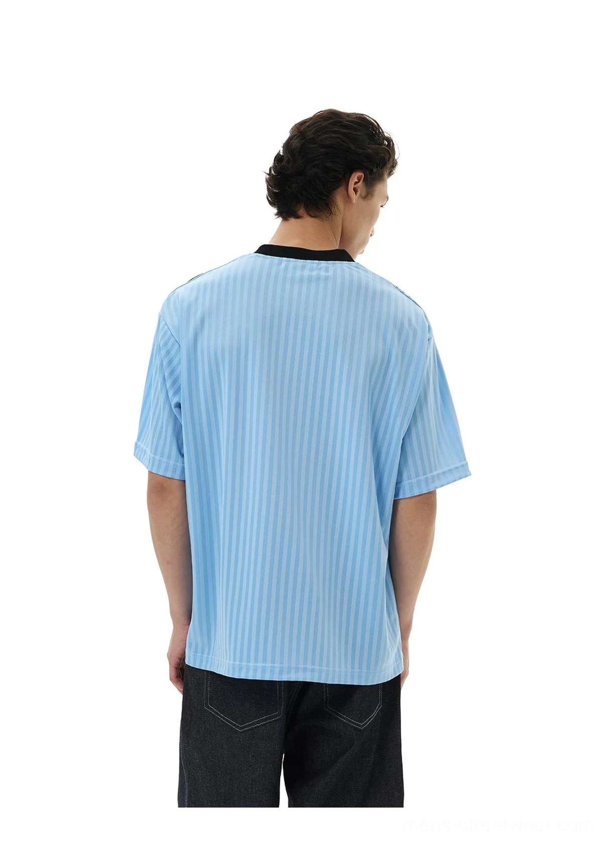 Back view of a light blue soccer jersey tee with all-over vertical pinstripes and a clean oversized streetwear silhouette