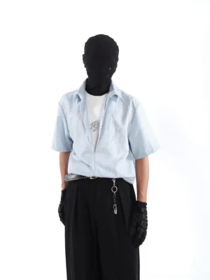 Upper-body view of a light blue striped short-sleeve layered shirt with a relaxed collar and partially unbuttoned front
