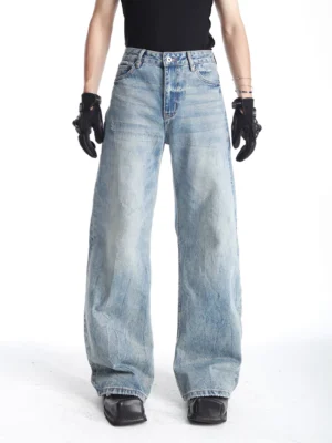 Men's light blue vintage wash barrel-leg jeans front full-body view with relaxed wide-leg streetwear silhouette