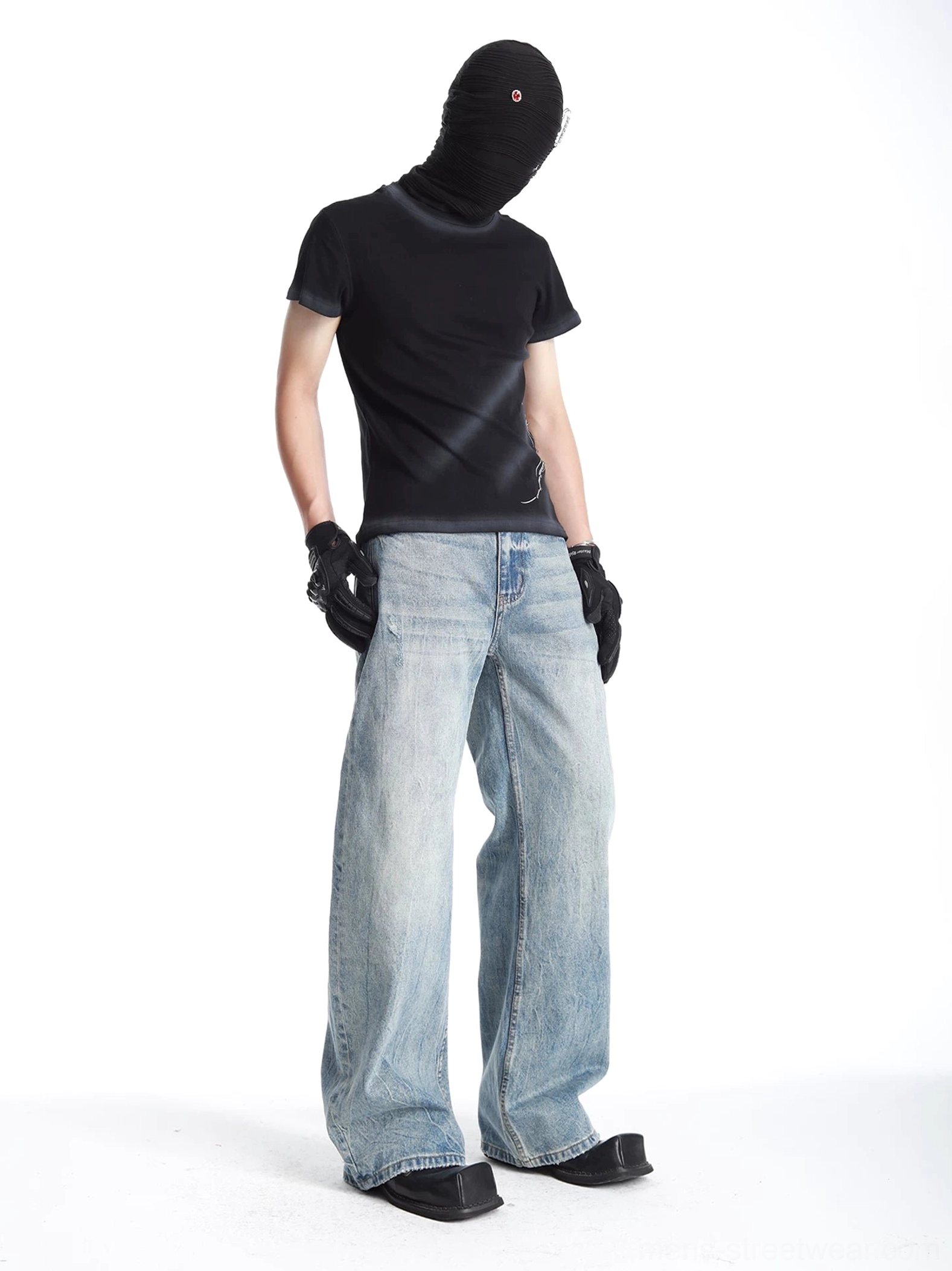 Men's light blue faded barrel-leg jeans three-quarter rear view with relaxed wide-leg Korean streetwear fit