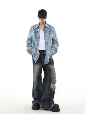 Light blue washed plaid overshirt styled with a white tee and wide-leg ripped jeans for relaxed Korean streetwear fashion